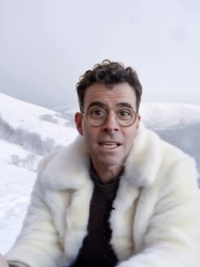 Instagram head Adam Mosseri in a video wearing an AI generated coat.